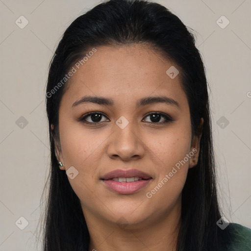 Joyful latino young-adult female with long  black hair and brown eyes