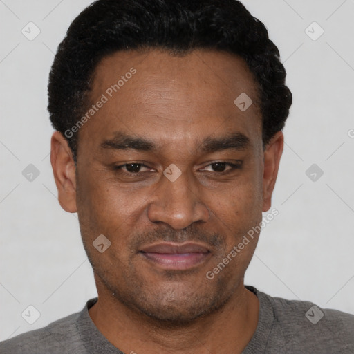 Neutral latino adult male with short  black hair and brown eyes