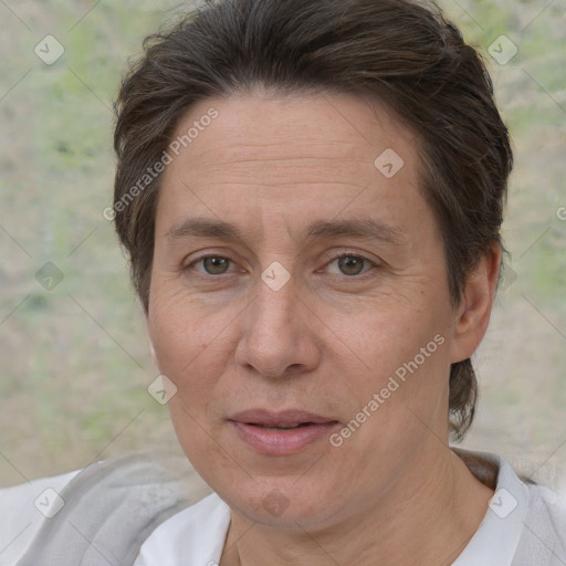 Joyful white adult female with short  brown hair and brown eyes