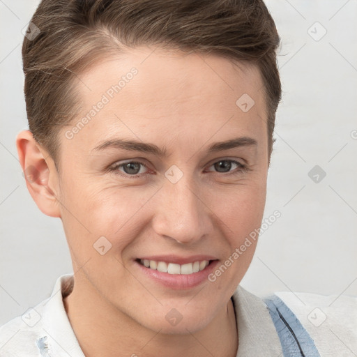 Joyful white young-adult female with short  brown hair and grey eyes