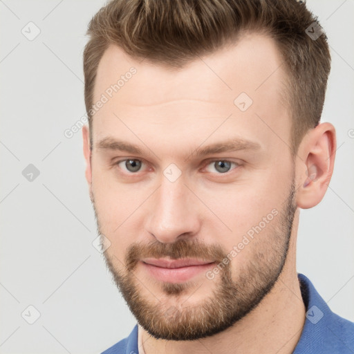 Neutral white young-adult male with short  brown hair and grey eyes