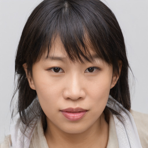 Neutral asian young-adult female with medium  brown hair and brown eyes