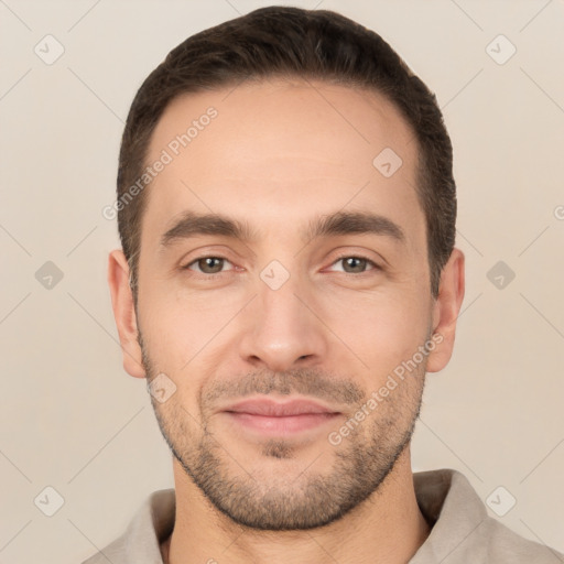 Joyful white young-adult male with short  brown hair and brown eyes