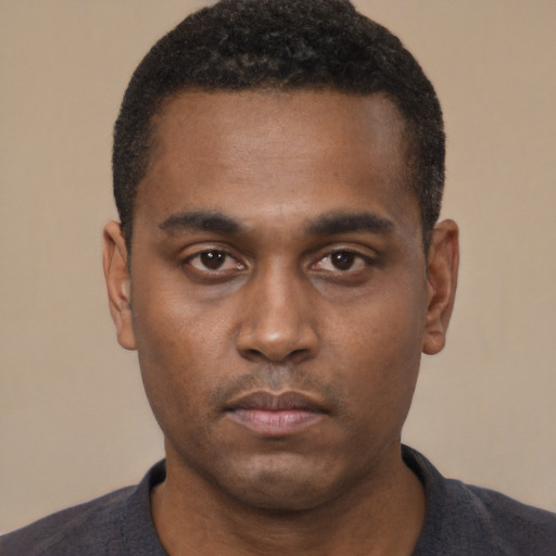 Neutral black young-adult male with short  black hair and brown eyes
