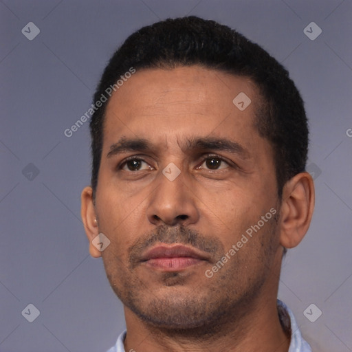 Neutral latino adult male with short  black hair and brown eyes