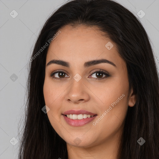 Joyful white young-adult female with long  brown hair and brown eyes