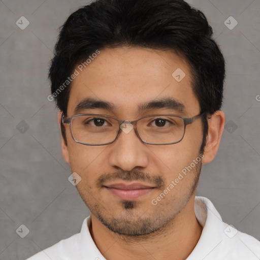 Joyful white young-adult male with short  black hair and brown eyes