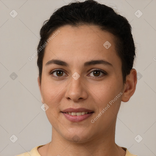 Joyful white young-adult female with short  brown hair and brown eyes