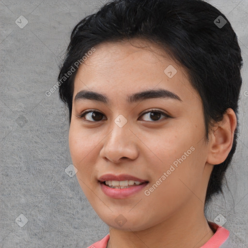 Joyful asian young-adult female with medium  black hair and brown eyes