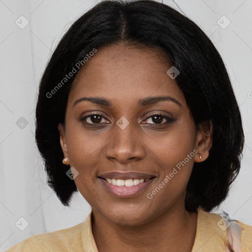 Joyful black young-adult female with medium  black hair and brown eyes