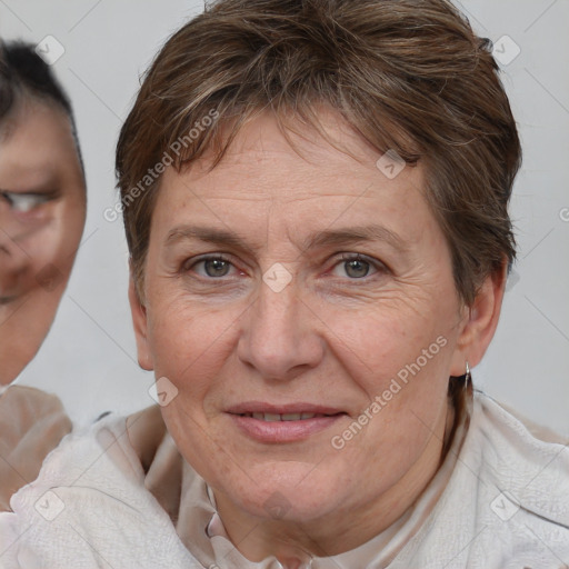 Joyful white adult female with short  brown hair and brown eyes