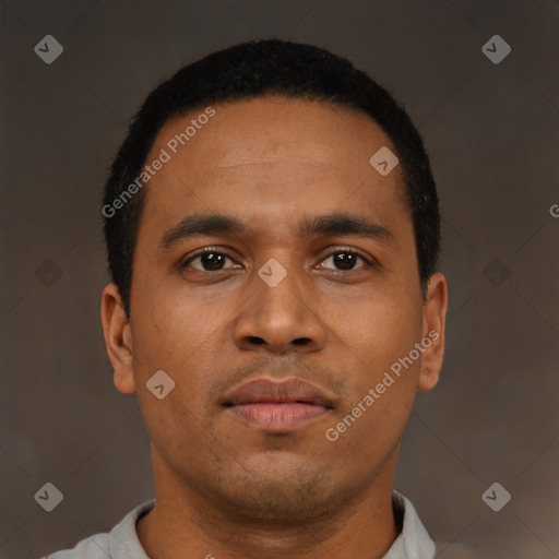 Neutral latino young-adult male with short  brown hair and brown eyes