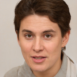 Joyful white adult female with short  brown hair and brown eyes