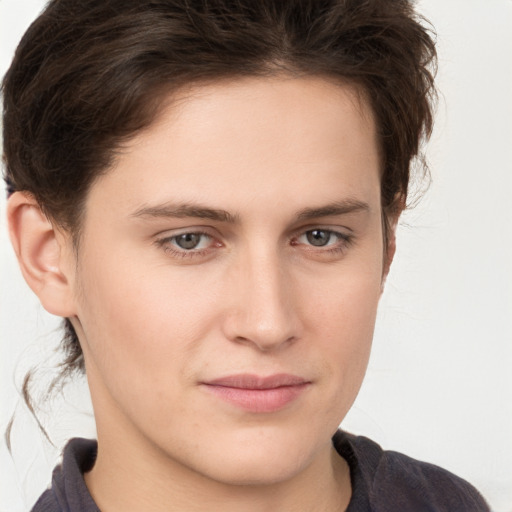 Joyful white young-adult male with medium  brown hair and brown eyes