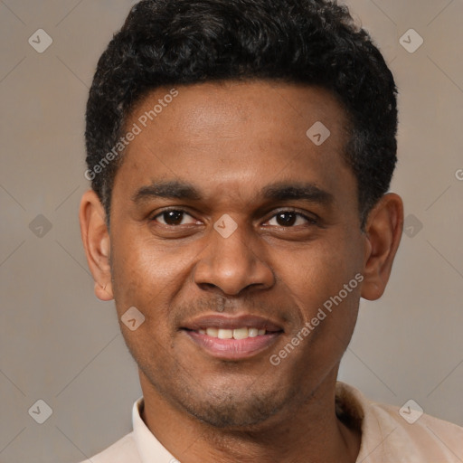 Joyful latino young-adult male with short  black hair and brown eyes