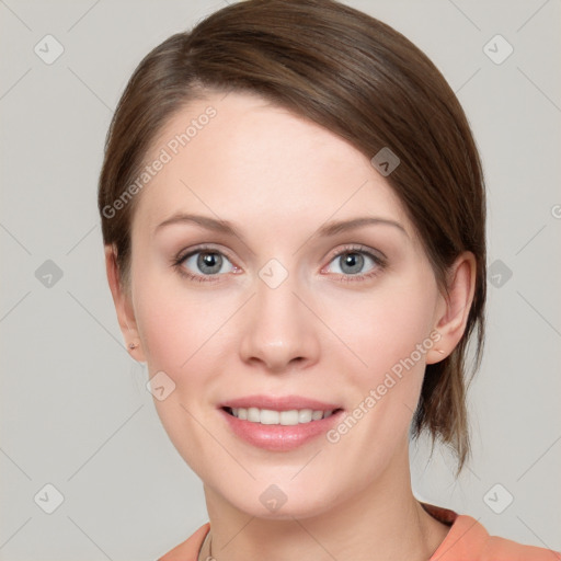 Joyful white young-adult female with medium  brown hair and blue eyes