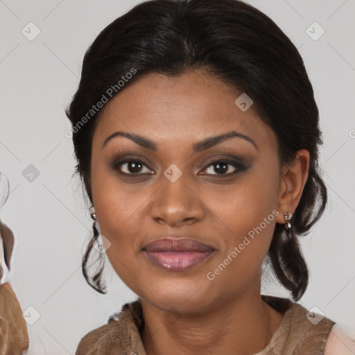 Joyful black young-adult female with medium  brown hair and brown eyes