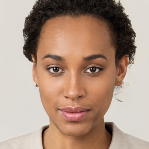 Neutral black young-adult female with short  brown hair and brown eyes