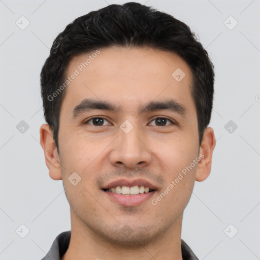 Joyful white young-adult male with short  black hair and brown eyes