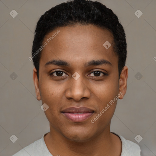 Joyful black young-adult male with short  black hair and brown eyes