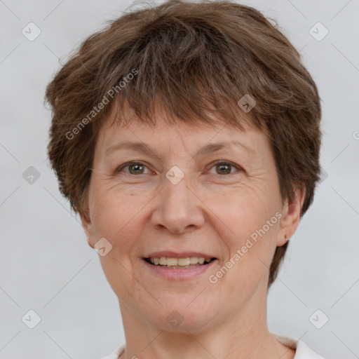 Joyful white adult female with short  brown hair and brown eyes