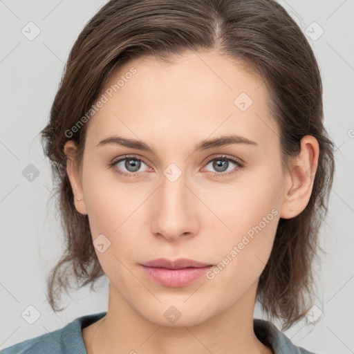 Neutral white young-adult female with medium  brown hair and grey eyes