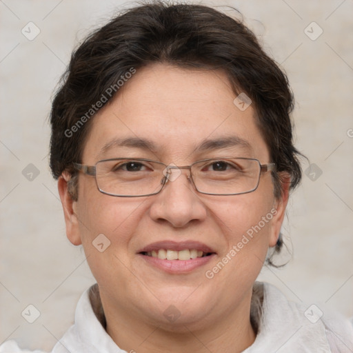 Joyful white adult female with short  brown hair and brown eyes