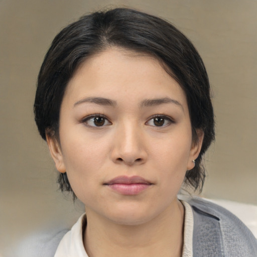 Neutral asian young-adult female with medium  black hair and brown eyes