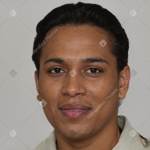 Joyful black young-adult female with short  black hair and brown eyes