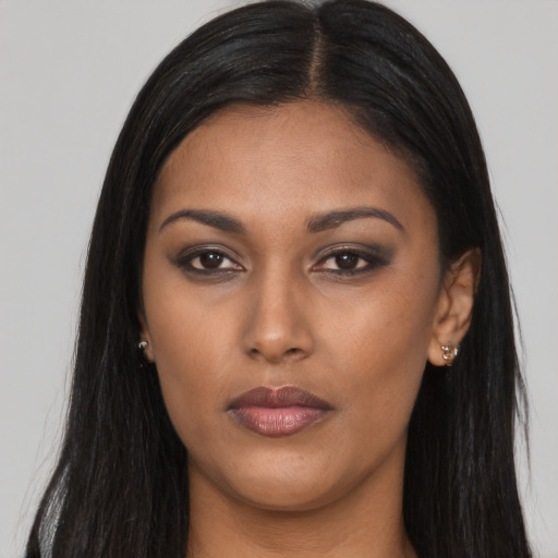 Neutral asian young-adult female with long  brown hair and brown eyes