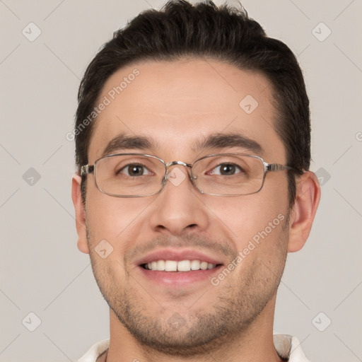 Joyful white young-adult male with short  brown hair and brown eyes