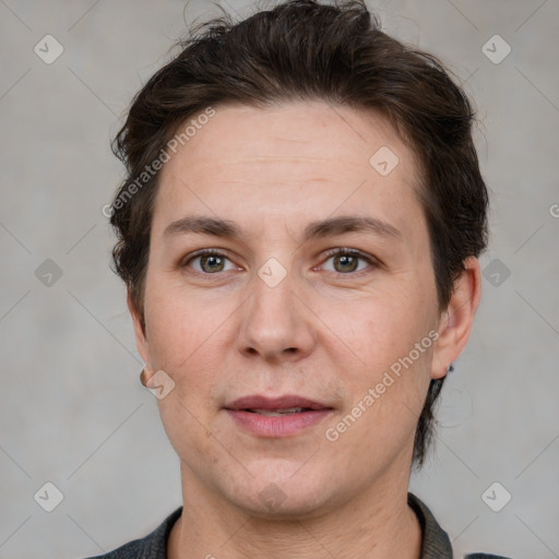 Joyful white adult female with short  brown hair and brown eyes