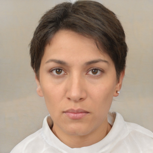 Neutral white young-adult female with short  brown hair and brown eyes