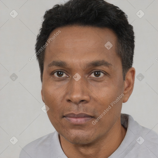 Neutral black adult male with short  black hair and brown eyes