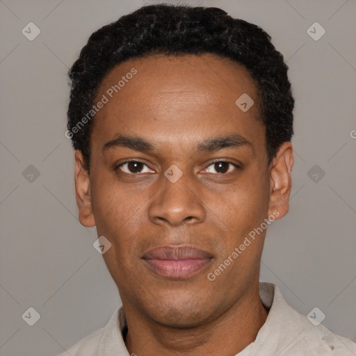 Neutral black young-adult male with short  black hair and brown eyes