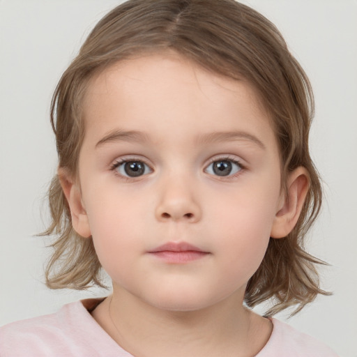 Neutral white child female with medium  brown hair and brown eyes