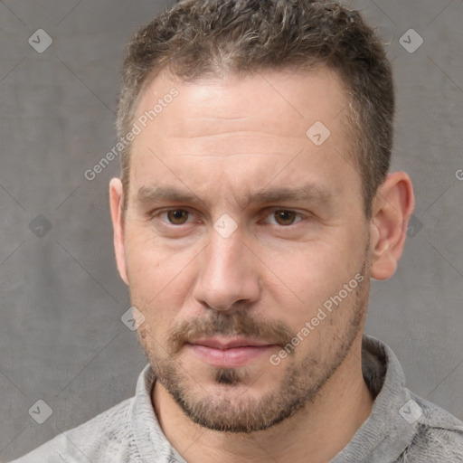 Neutral white adult male with short  brown hair and grey eyes