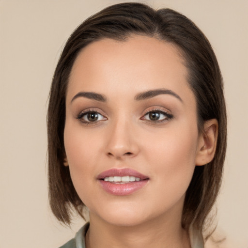 Joyful white young-adult female with medium  brown hair and brown eyes