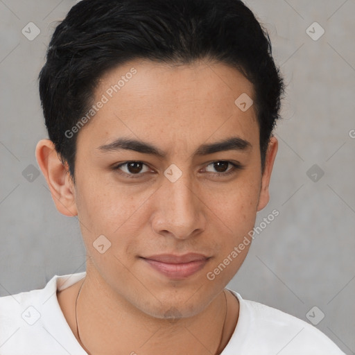 Joyful latino young-adult male with short  brown hair and brown eyes