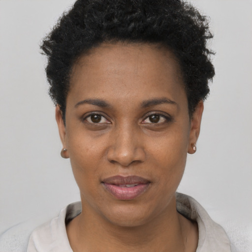Neutral black young-adult female with short  black hair and brown eyes