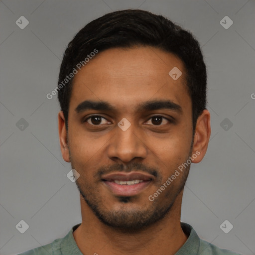 Joyful black young-adult male with short  black hair and brown eyes