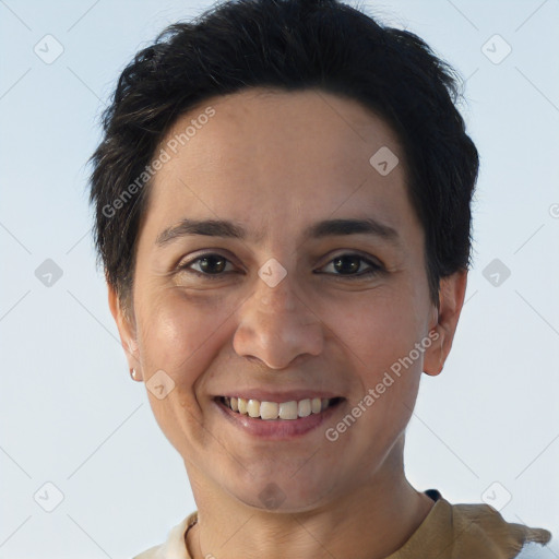 Joyful white adult female with short  brown hair and brown eyes