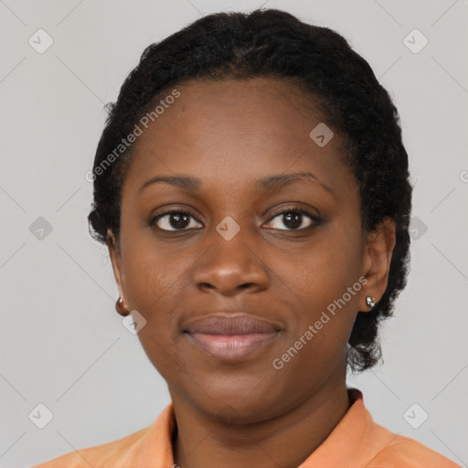 Joyful latino young-adult female with short  black hair and brown eyes