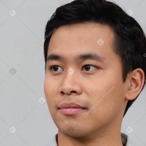 Neutral asian young-adult male with short  black hair and brown eyes