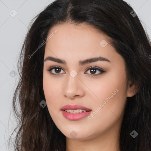 Joyful asian young-adult female with long  brown hair and brown eyes