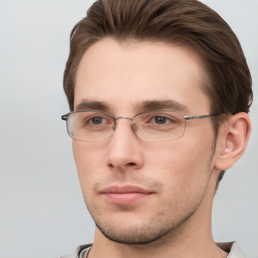 Neutral white young-adult male with short  brown hair and grey eyes