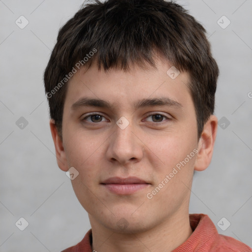 Neutral white young-adult male with short  brown hair and grey eyes