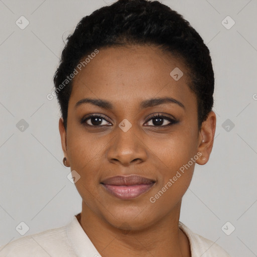 Joyful black young-adult female with short  black hair and brown eyes