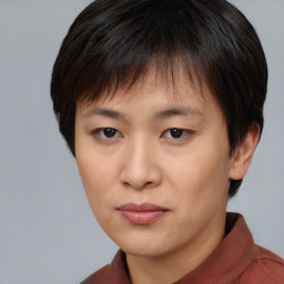 Neutral asian young-adult female with short  brown hair and brown eyes