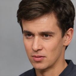 Neutral white adult male with short  brown hair and brown eyes